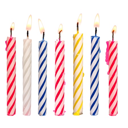 Set of colored birthday candles isolated on whiteの写真素材