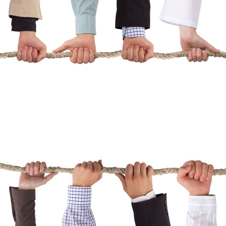 Hands holding a rope isolated on white, conceptual backgroundの写真素材