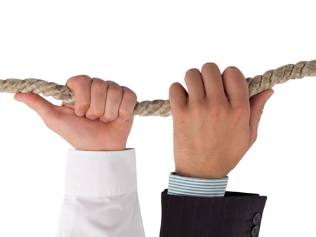Hands holding rope, teamwork concept