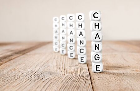 White cube blocks with Chance and Change concept words imprinted; focused on Change; concept of Opportunity and Successの写真素材