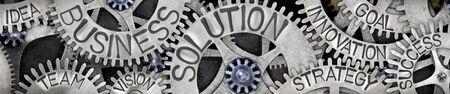 Group of tooth wheels with Busness Solution, Innovation, Strategy and Goal concept related words imprinted on metal surfaceの写真素材