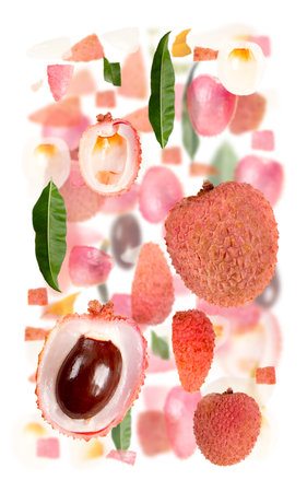 Abstract background made of Litchi fruit pieces, slices and leaves isolated on white.の写真素材