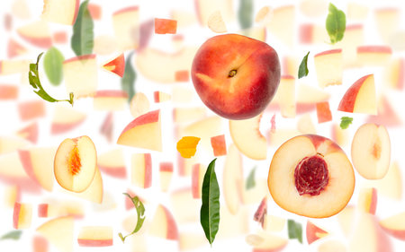 Abstract background made of Peach fruit pieces, slices and leaves isolated on white.の写真素材