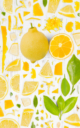 Lemon fruit piece, slice and leaf collection. Flat lay, seamless abstract on wooden background.の写真素材