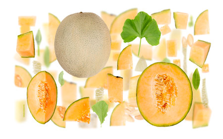 Abstract background made of Sugar Melon fruit pieces, slices and leaves isolated on white.の写真素材