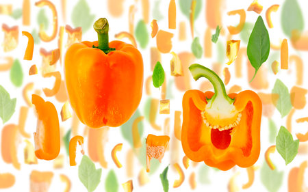 Abstract background made of Orange Pepper vegetable pieces, slices and leaves isolated on white.の写真素材