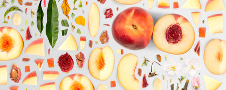 Peach fruit piece, slice and leaf collection. Flat lay, seamless abstract isolated on gray background.の写真素材