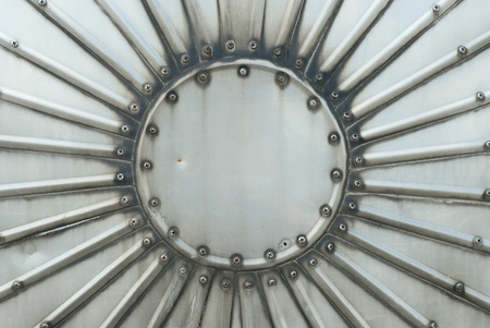 Metal Plate with Circular and Linear Design Elementsの写真素材
