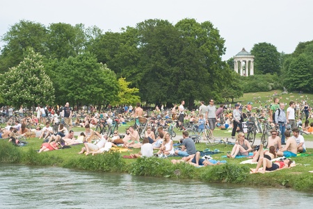 Munich, Germany  May 20   After the Champions League Final, Chelsea and Bayern Munich Fans relax in the English Garden May 20, 2012 in Munich のeditorial素材