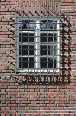 Brick Wall with Window Wrought Iron Guard