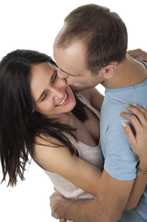 a view of loving couple kissing on white background