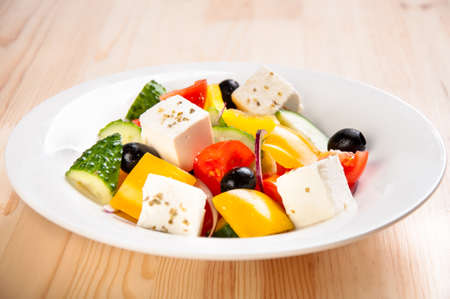 Vegetable greek salad with cheese and tomatoesの写真素材