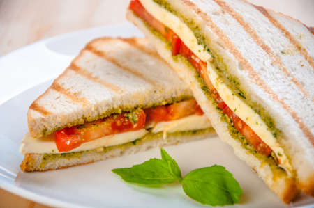 Bread sandwich with cheese, tomato. Healthy vegetarian snacks. fast food.の写真素材