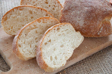 Sliced ciabatta bread on the board