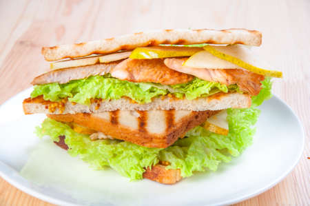 sandwich with turkey, cheese and vegetables, pearsの写真素材