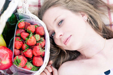 beautiful woman on the picnic with basketの写真素材