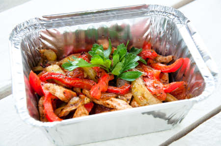 chicken and vegetables stir fried for fajitasの写真素材