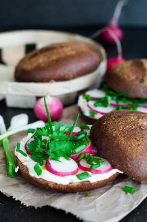 Italian tomato bruschetta with chopped vegetables, herbs and oil on grilled or toasted crusty ciabatta breadの写真素材