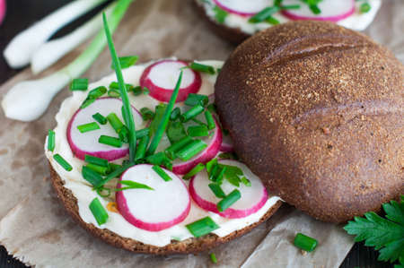 Italian tomato bruschetta with chopped vegetables, herbs and oil on grilled or toasted crusty ciabatta breadの写真素材