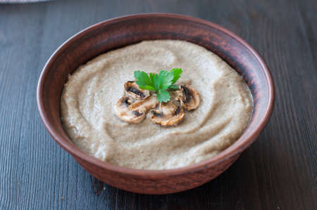 bowl of vegetarian mushroom puree soupの写真素材