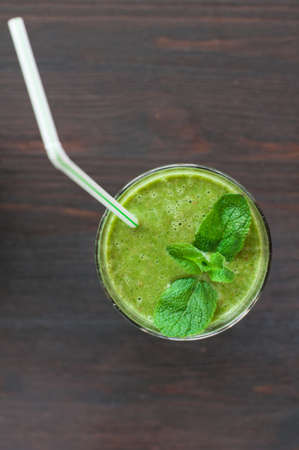 fresh homemade smoothie with spinach and bananas