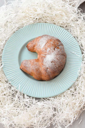 delicious breakfast with fresh croissants on the plateの写真素材