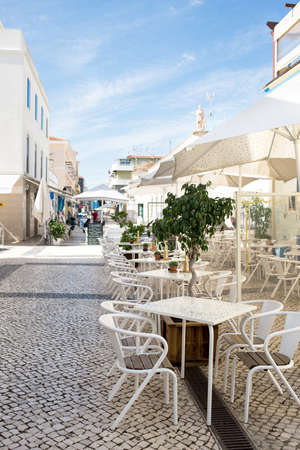 restaurant air cafe chairs with tables in Portugalの写真素材