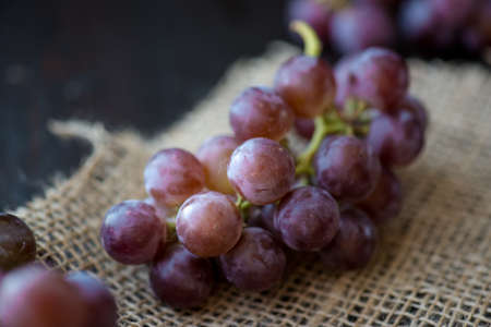 Organic Raw Red Grapes in a Basket