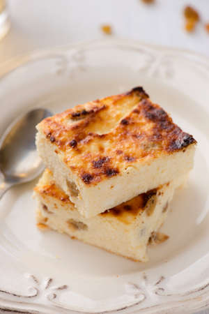 Appetizing cottage cheese casserole with raisins, close upの写真素材