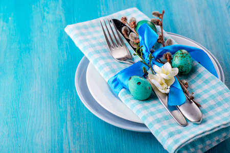 Easter table setting with eggs and cutlery.の写真素材