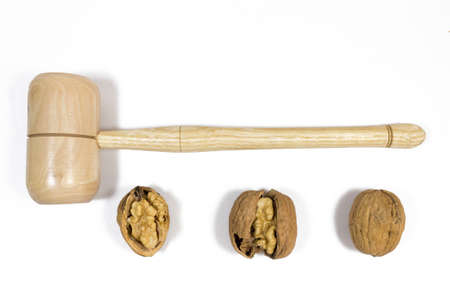 Walnuts with nutcracker. Isolated white background. Nuts.の写真素材