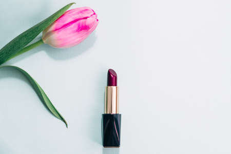 beautiful lipstick on white background. copy save. March 8 - International Women's Day. holiday for girlsの写真素材
