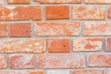 red rubbed brick wall. Beautiful brick background.