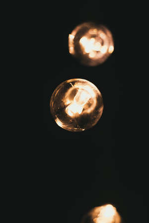 retro style incandescent lamps. Light bulbs in the dark.