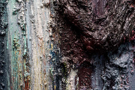 streaks of paint, foam on the wall in dark colors. Abstract background in blue, gray, black colors.の写真素材