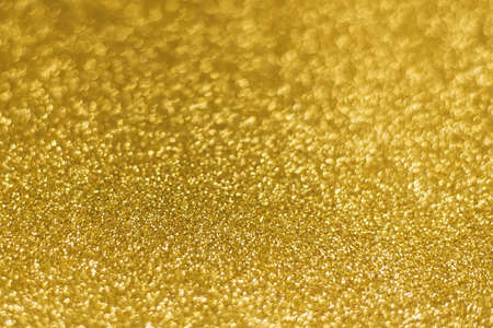 Golden shiny background. gold glitter texture christmas abstract background