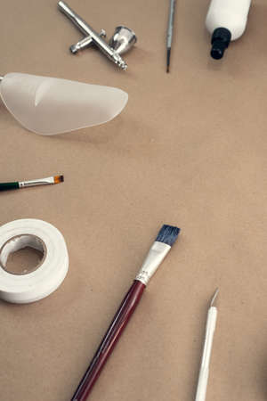 Shaped holders, brushes and brushes for cleaning, painting and repairing shoes. A set of objects and tools for the work of a shoe master.の写真素材