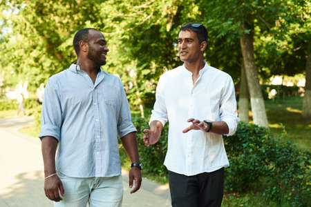 Two black men are speaking. Friendship between black man.の写真素材