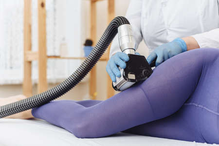 Cosmetologist. Lymphatic drainage massage LPG apparatus process. LPG massage for lifting body.の写真素材