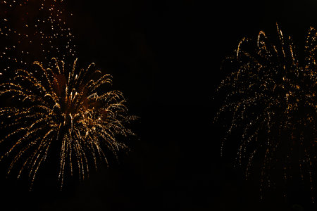 Golden salute Isolated on a black background. Celebrating July 4th - Independence Dayの写真素材