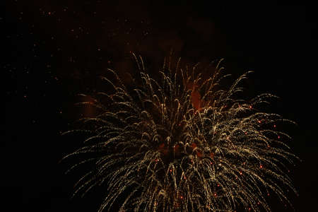 Golden salute Isolated on a black background. Celebrating July 4th - Independence Dayの写真素材