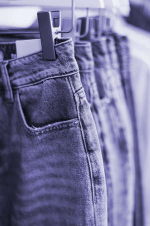 Jeans in purple in store in a very classy 2022 color. Color of the year 2022 Very Peri.の写真素材