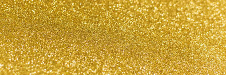 Golden shiny background. gold glitter texture christmas abstract background. Web bannerの写真素材