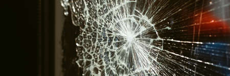 broken glass against the background of the night city and night lights. Web banner.