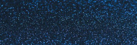 Glowing sparkles on blue color trendy background. Holiday bright brilliant beautiful background, template for blog or designers. Web banner. New Year 2020の写真素材