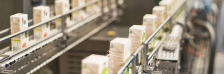 production of juices in cardboard packaging. Industry, Metal Works. Web banner.の写真素材