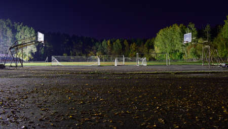 The evening stadium is open for sports in the fallの写真素材