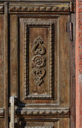 The old entrance door to the building dating back to the early 20th century.の写真素材