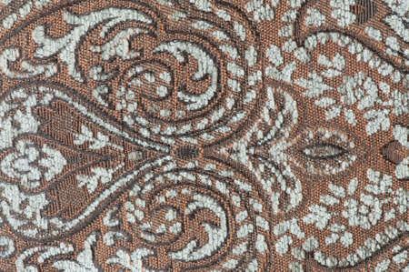 antique fabric with floral pattern and various colorsの写真素材