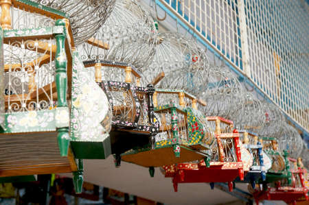 Tunisian decorated birdcages hanging in a tunisian soukのeditorial素材